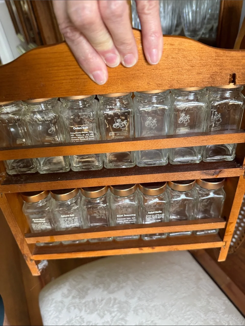 Vintage Glass Spice Jar Set with Copper Lids on Wooden Rack